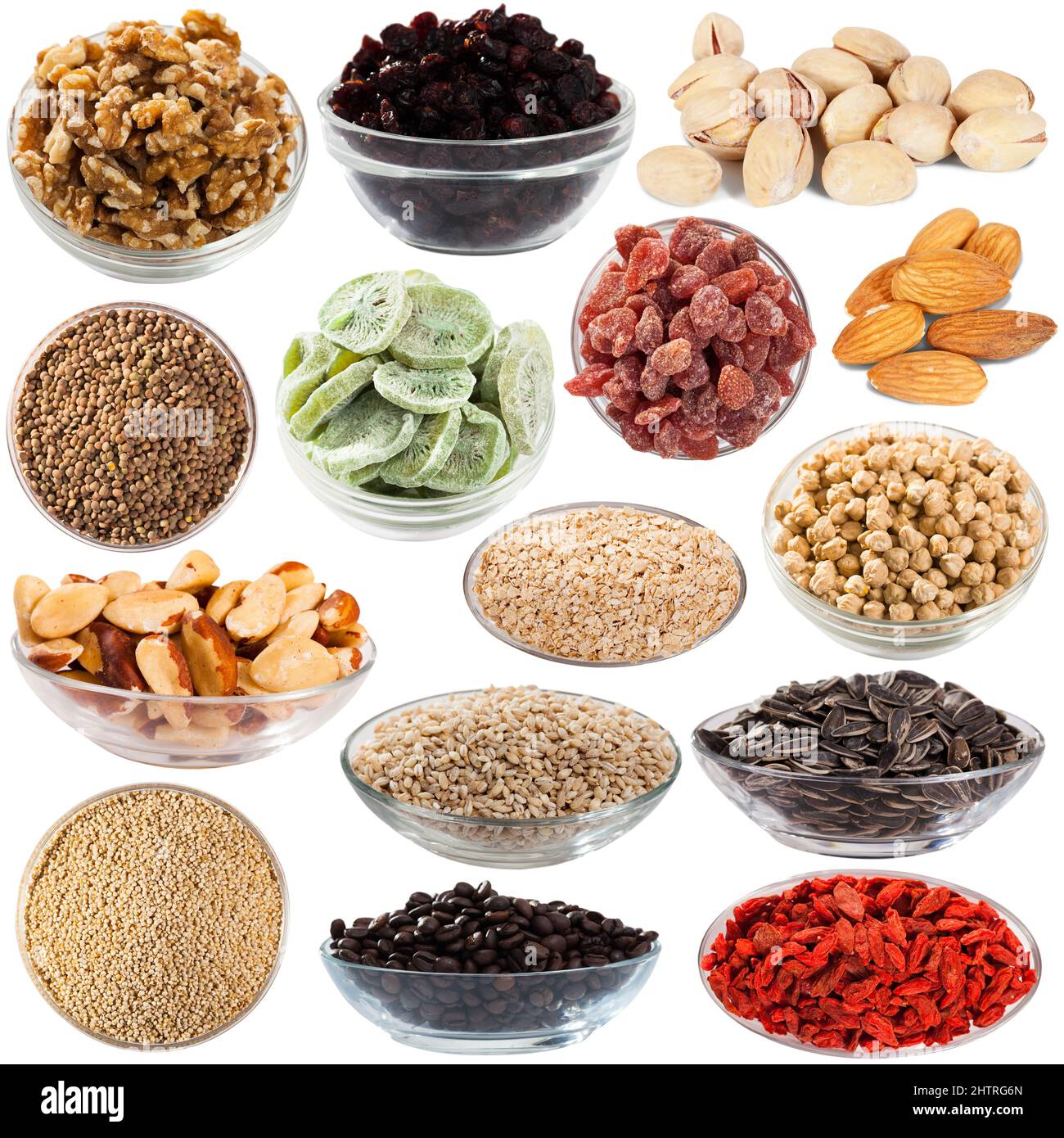 Plaques avec produits secs et en vrac diffrents isolés sur fond blanc Banque D'Images