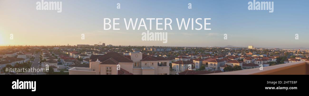 Son temps de faire un changement, son temps d'aider. Photo d'une banlieue dans la ville avec les mots être Water Wise illustré ci-dessus. Banque D'Images