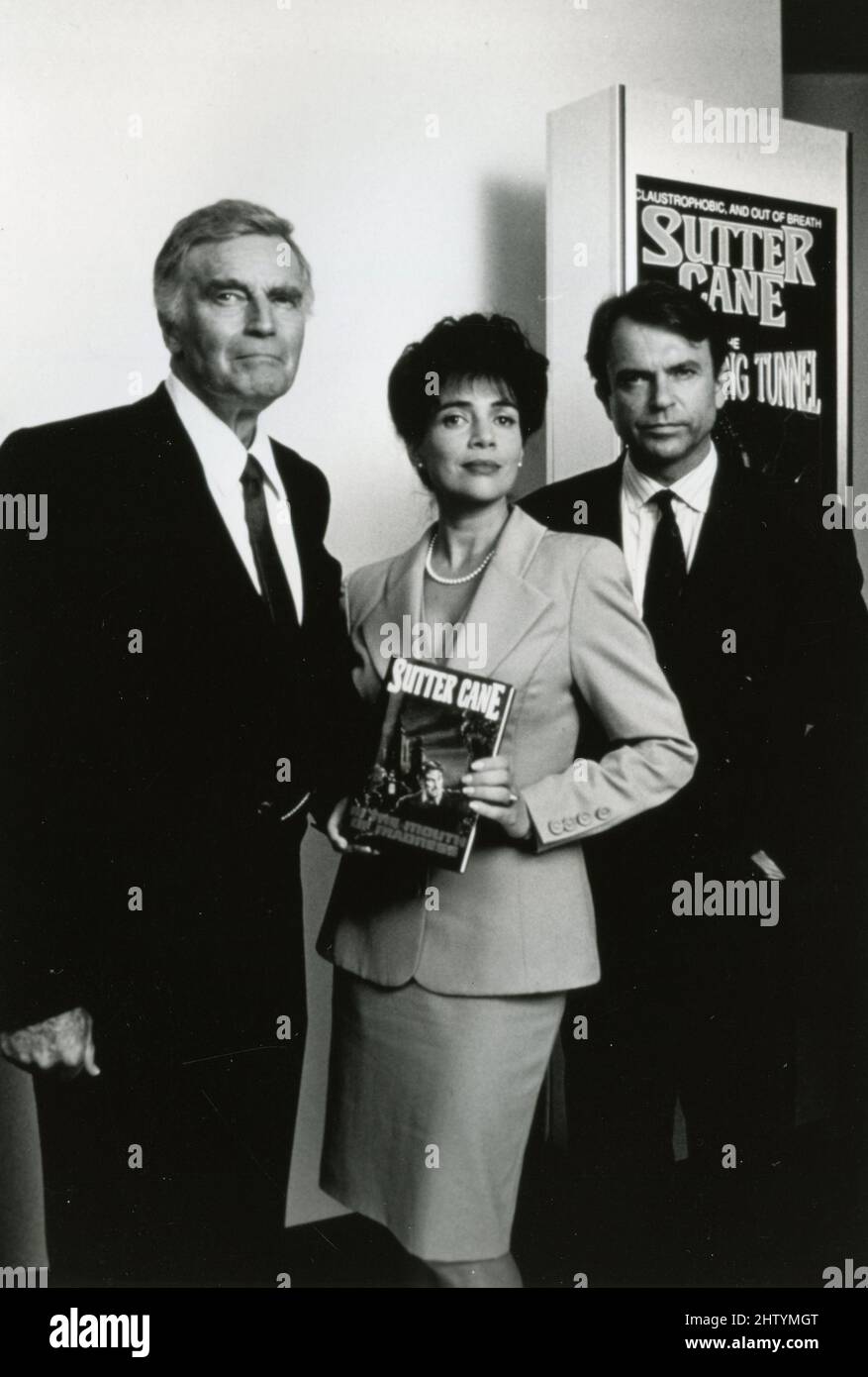 Sam Neill, Julie Carmen, et Charlton Heston dans le film The Mouth of Madness, USA 1994 Banque D'Images