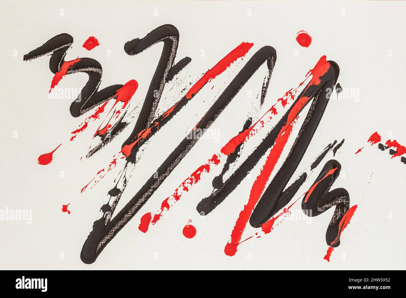 Pinceau à encre noire rouge sur blanc. Photo dessinée à la main. Arrière-plan abstrait Banque D'Images