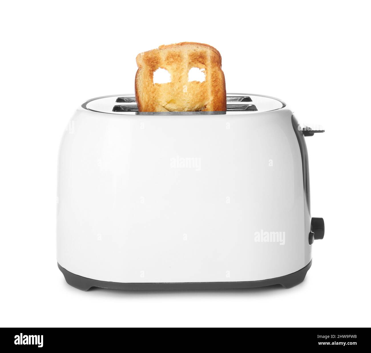 Une tranche de pain drôle dans le grille-pain sur fond blanc Photo Stock -  Alamy