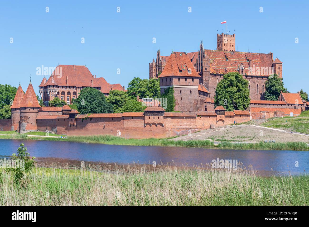 Le plus grand château du monde par terre, classé au patrimoine mondial de l'UNESCO, le château de Malbork est un merveilleux exemple de forteresse teutonique Banque D'Images