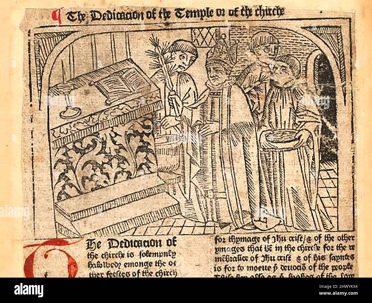 Coupe de bois du 15th siècle montrant une scène rarement représentée lors de la cérémonie de dédicace d'une église ou d'un temple médiéval, imprimée par William Caxton ( 1422-1491/92) Dans sa traduction de 'la Légende d'Or' ou 'donc endeth la legende nommée dans Latyn legenda aurea qui est à saye en Englyshe la legende d'Or' par Jacobus, de Voragine, (Circa 1229-1298). Banque D'Images