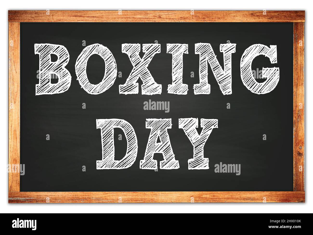 LE LENDEMAIN DE NOËL est écrit sur le tableau noir de l'école à cadre en bois noir Banque D'Images