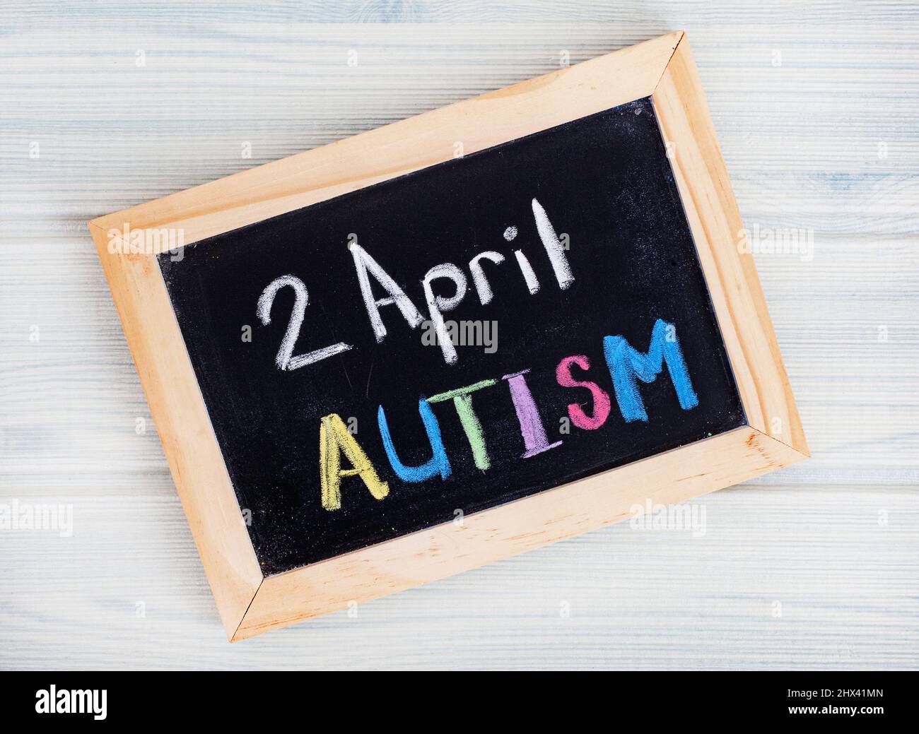 Autisme écrit sur tableau noir, 2 avril Journée mondiale de l'autisme Banque D'Images