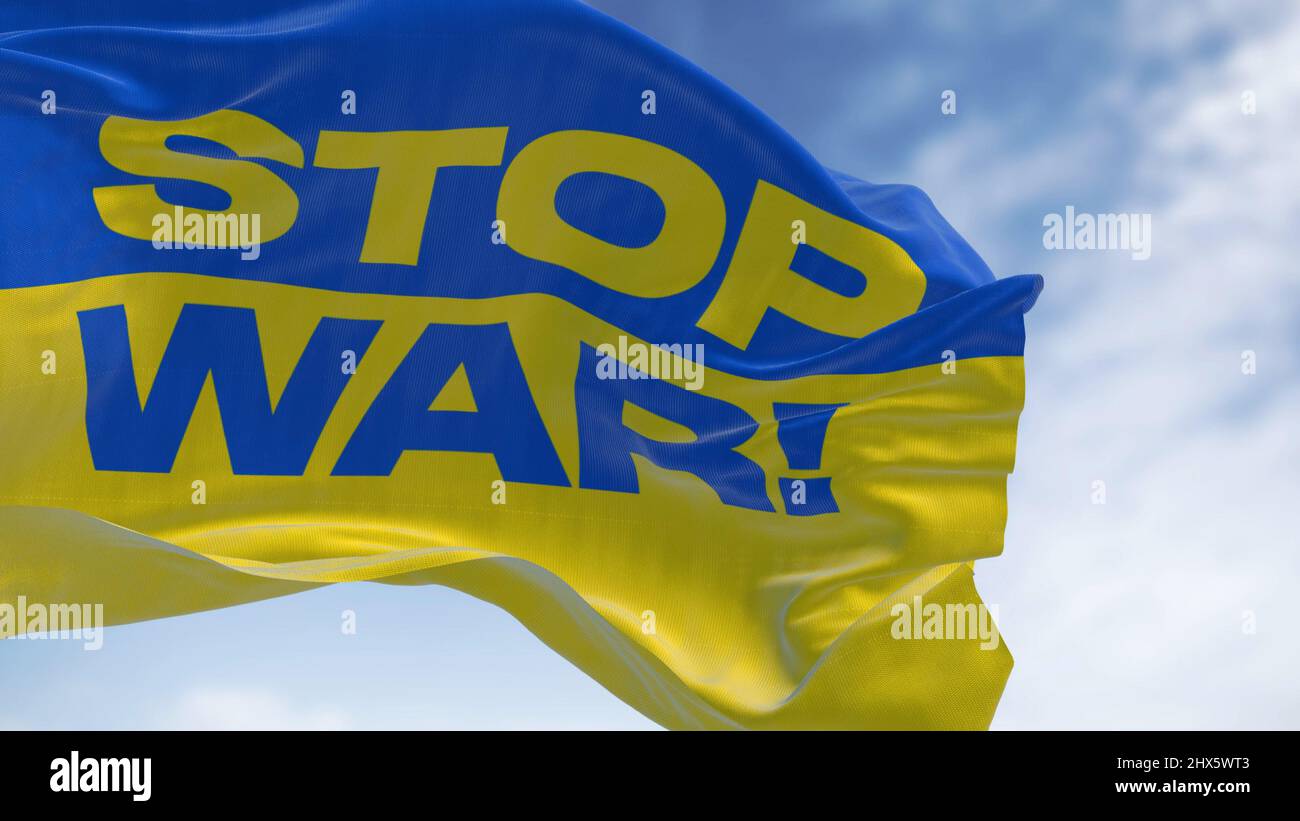 Détail du drapeau national de l'Ukraine avec le texte de la "guerre d'arrêt" agitant dans le vent . Démocratie et politique. Patriotisme. Mise au point sélective. Slo sans couture Banque D'Images