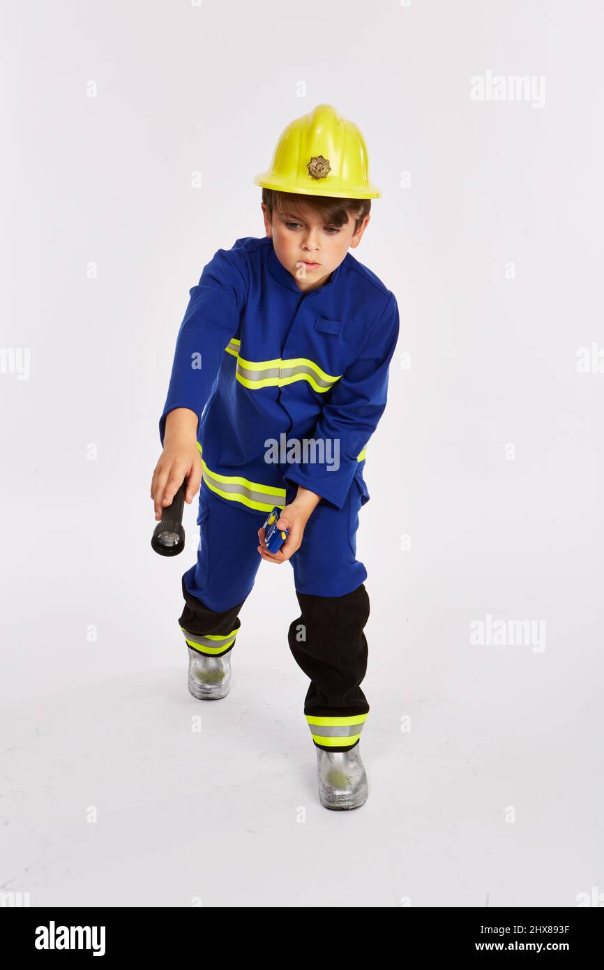 Costume de pompier. 11 ans. Banque D'Images