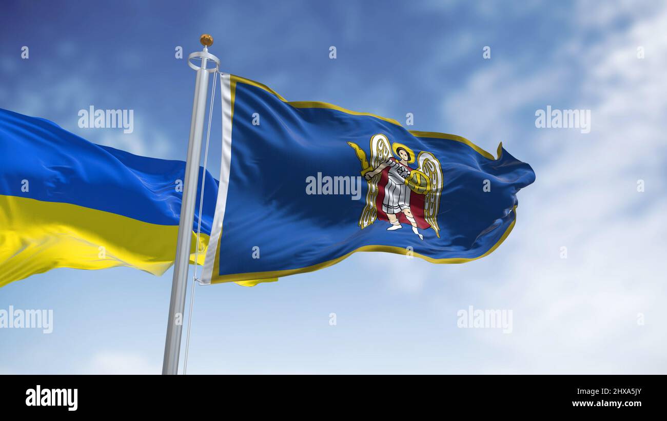 Le drapeau de la ville de Kiev avec la représentation de l'Archange Gabriel agitant avec le drapeau national ukrainien. Le Saint patron de l'Archange de Kiev Michael Banque D'Images