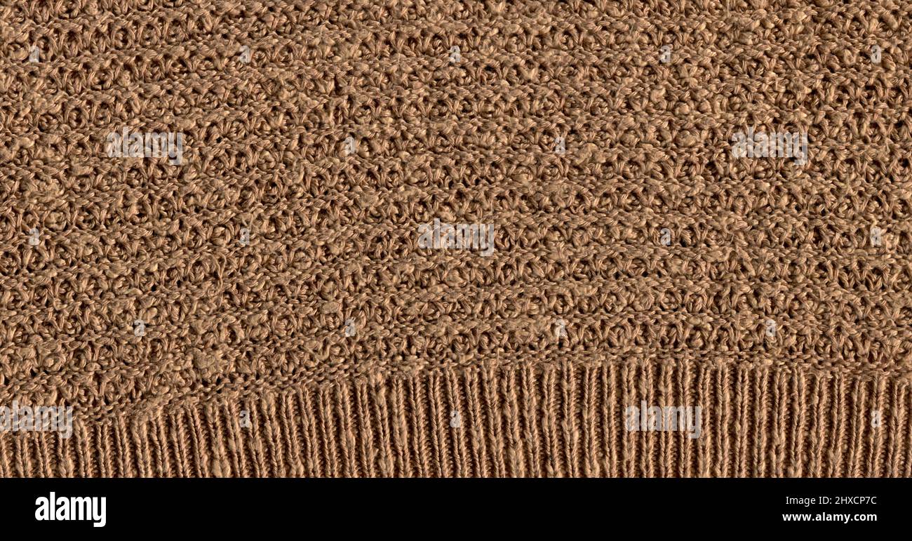 Texture de tissu brun de laine ou arrière-plan abstrait.Tissu tissé bordeaux confortable en angora. Banque D'Images