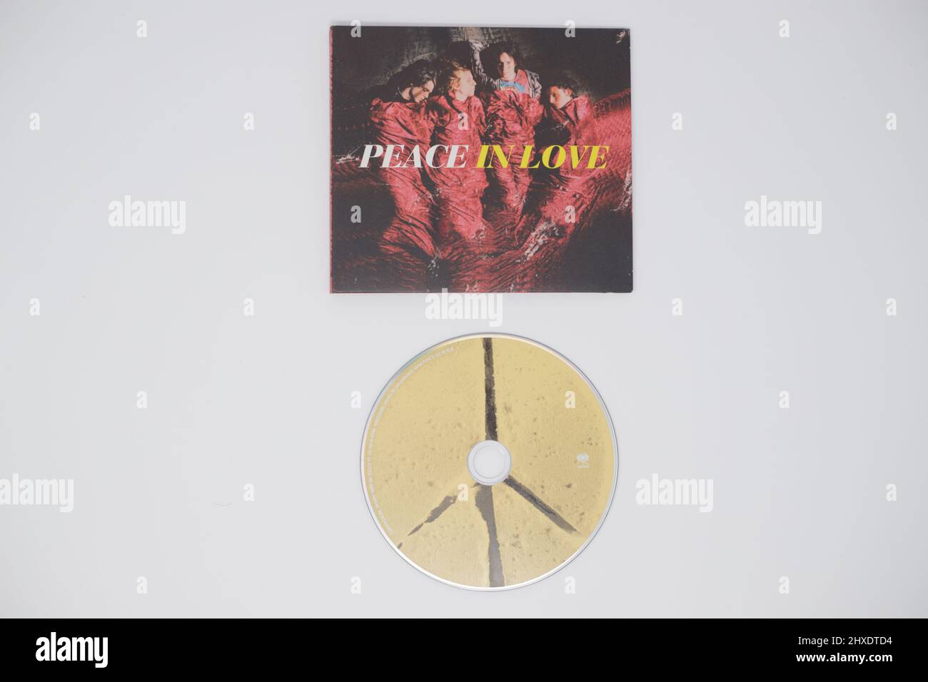 Peace - In Love album avec CD sur fond blanc Banque D'Images