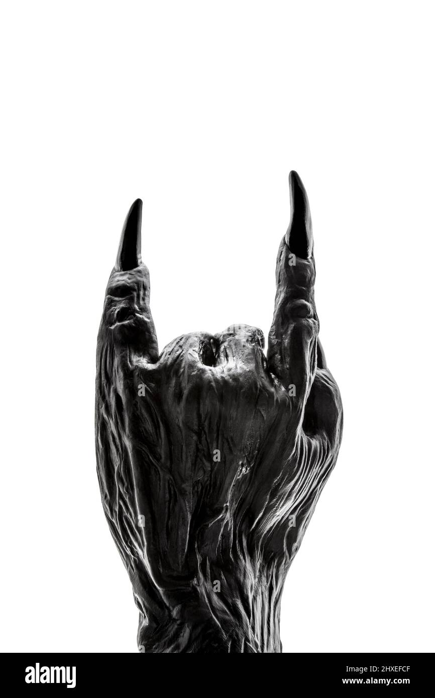 Main de monstre creepy montrant le rock ou diable cornes geste isolé sur blanc avec le chemin de coupure Banque D'Images