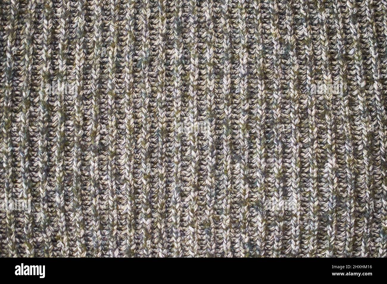 Texture du pull en laine tricoté gros plan, fond, format horizontal, rayures verticales Banque D'Images