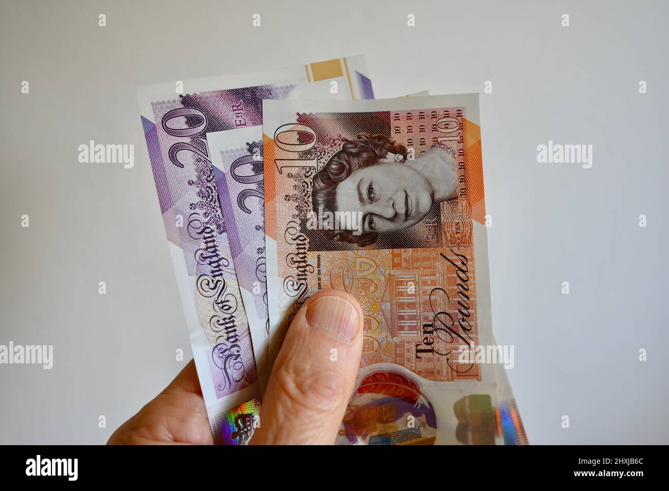 Gros plan de billets de dix et vingt livres. Banque D'Images