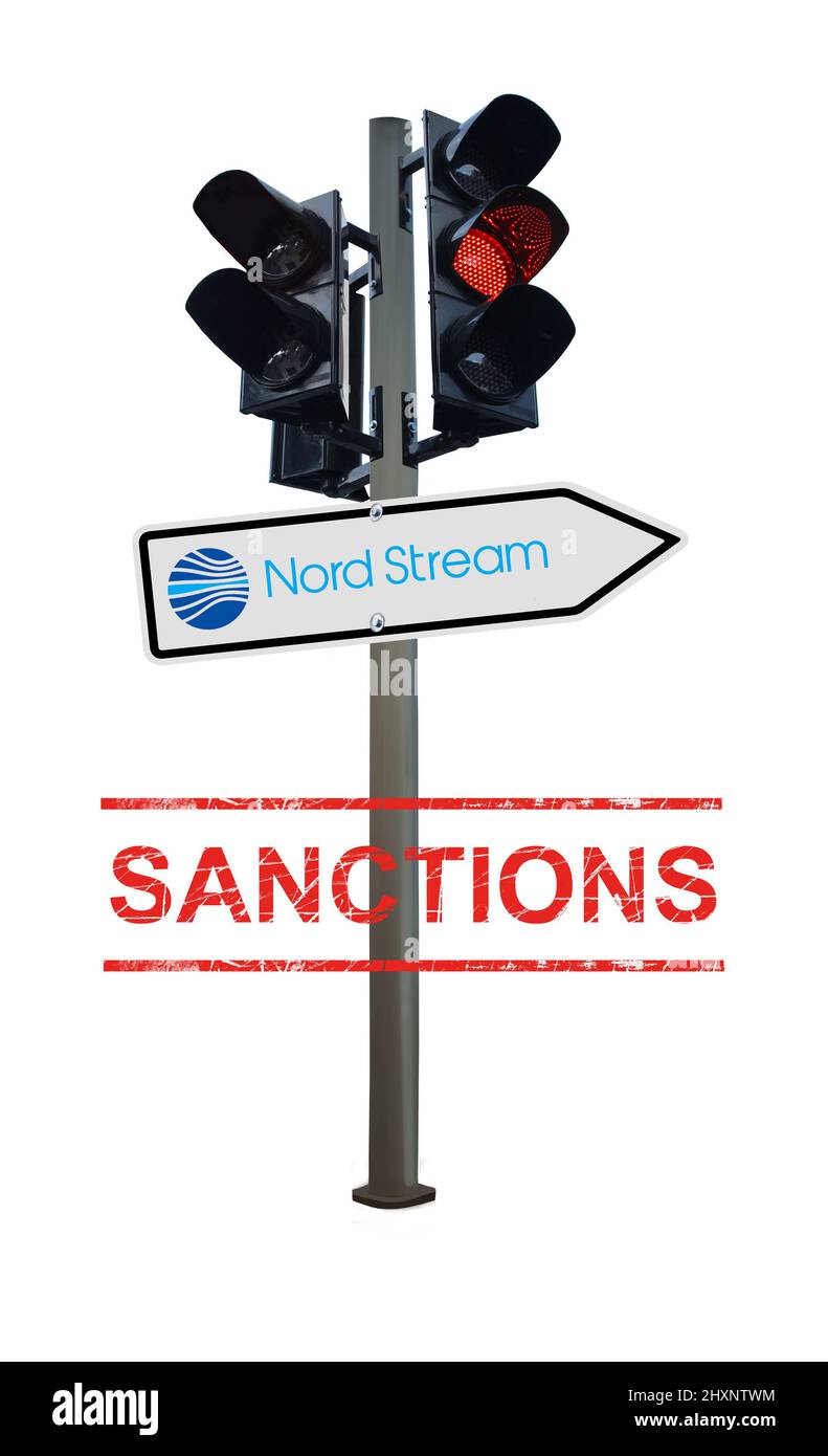 Symbole photo Nord Stream sanctions : feu de circulation avec panneau de signalisation avec logo sur fond blanc Banque D'Images