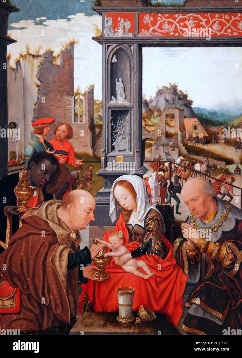 L'adoration des Mages (c.1520-1525) par Jan Jansz Mostaert (c.1474-1552) peintre hollandais de la Renaissance connu pour ses sujets religieux et ses portraits. Banque D'Images