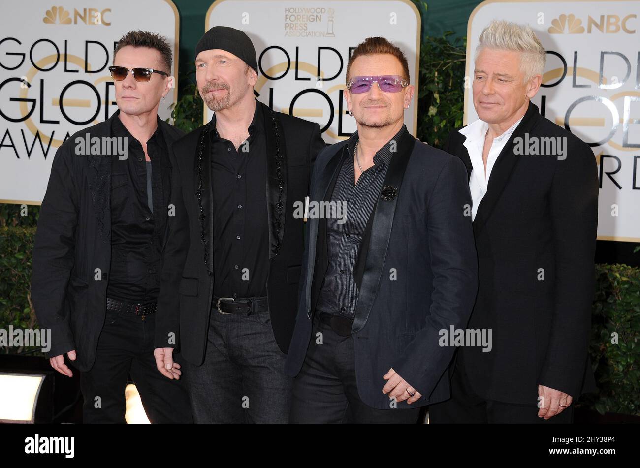 U2 assistez aux Golden Globe Awards 71st, qui se tiennent à l'hôtel Beverly Hilton le 12 janvier 2014. Banque D'Images