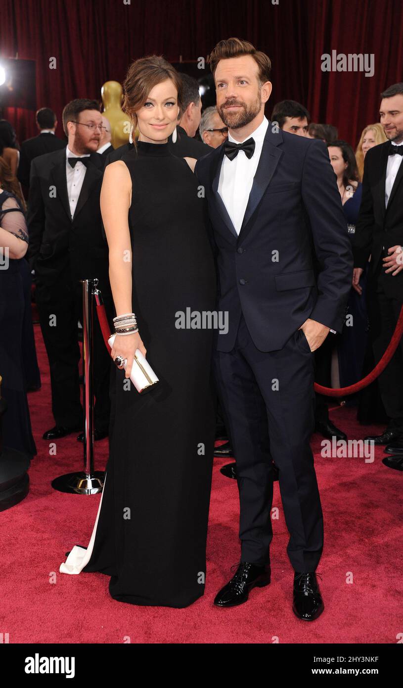 Olivia Wilde et Jason Sudeikis arrivent aux Academy Awards 86th qui se tiennent au Dolby Theatre à Hollywood, Los Angeles, CA, Etats-Unis, le 2 mars, 2014. Banque D'Images