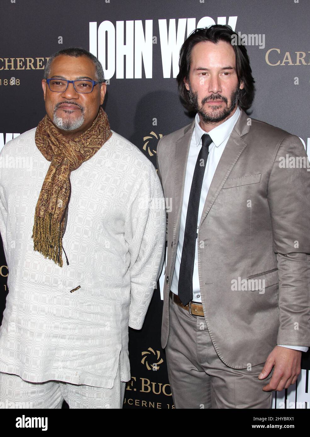 Laurence Fishburne et Keanu Reeves participant à la première de John Wick: Chapitre deux, à Los Angeles, Californie Banque D'Images