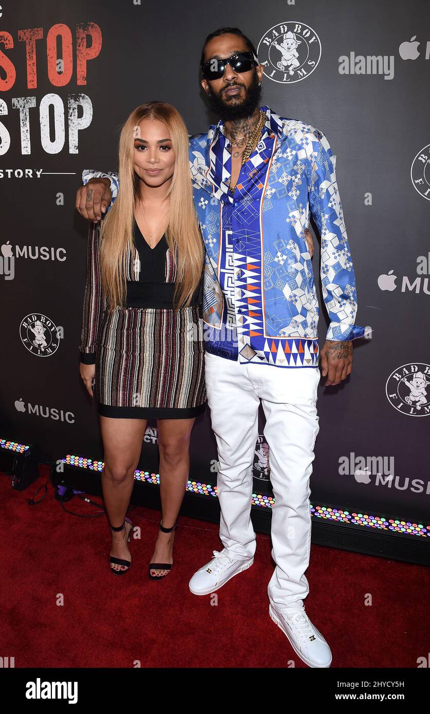 Lauren London et Nipsey hussle participant à la première « CAn't Stop, Won't Stop: A Bad Boy Story » tenue à la Writers Guild of America à Los Angeles, États-Unis Banque D'Images