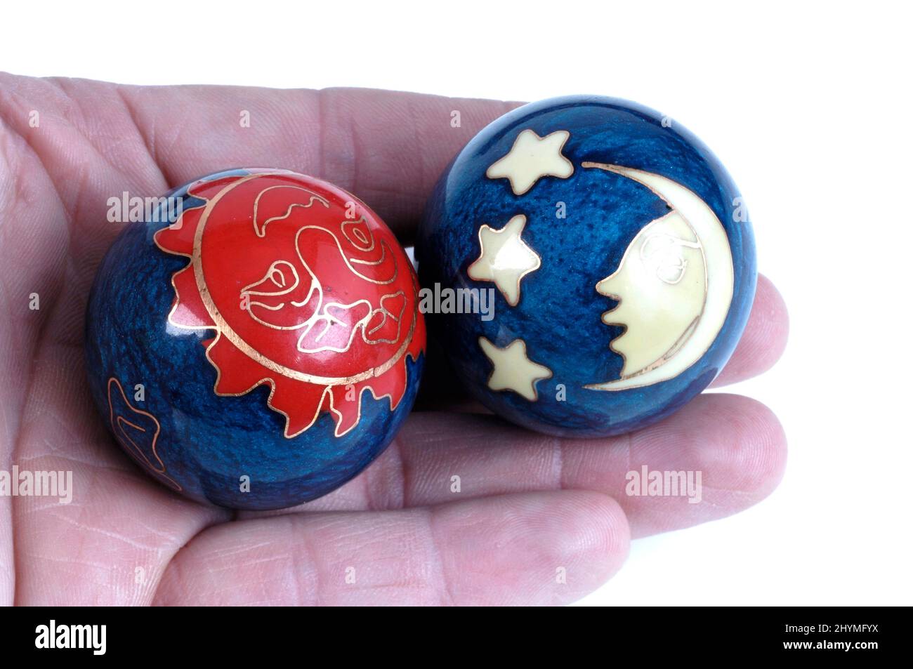 Balles Qi-Gong dans la main, coupées Banque D'Images