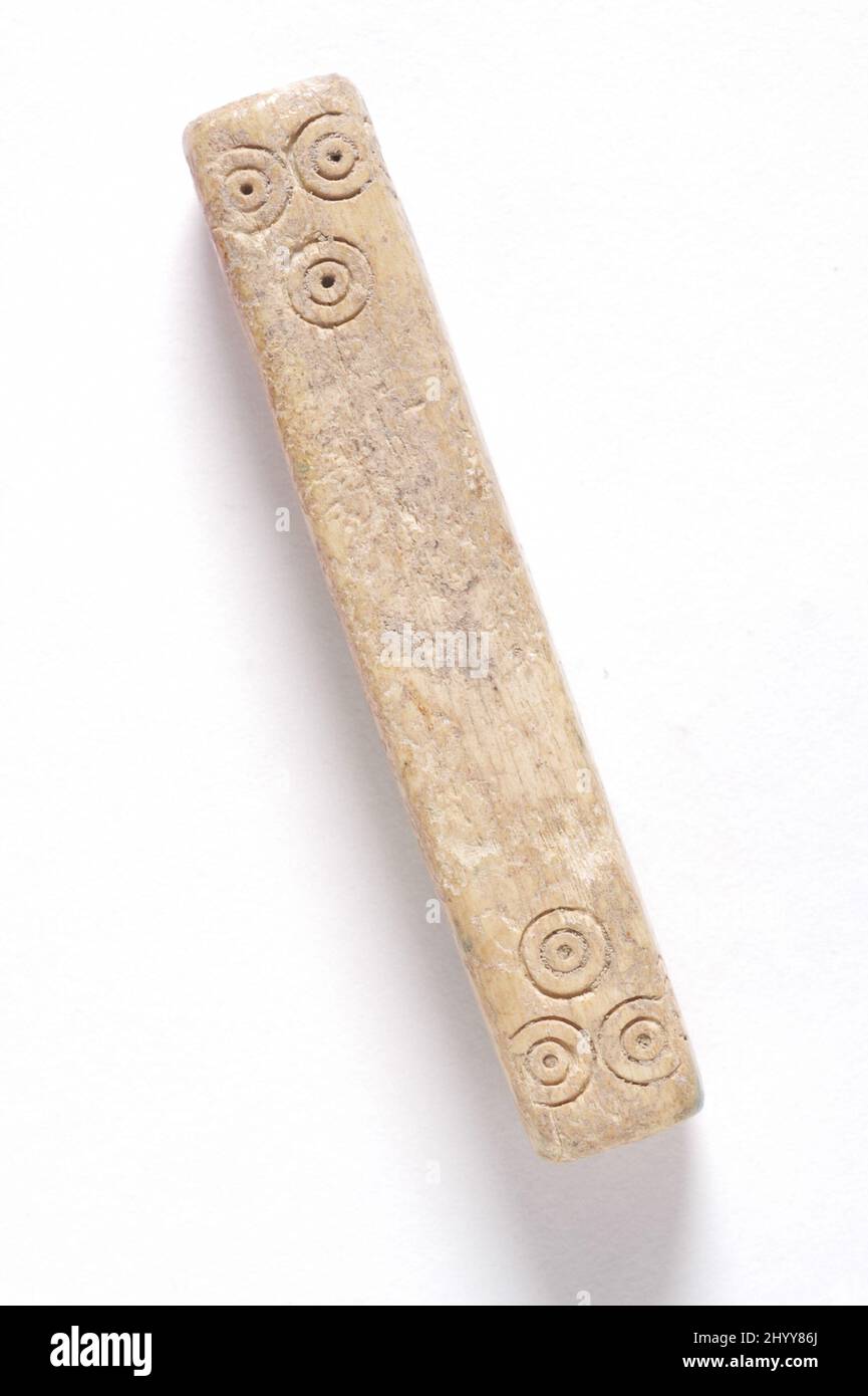 Pièce de jeu. Syrie, 10th-11th siècle. OS, sculpté et percé Banque D'Images