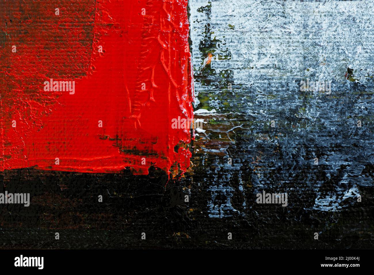 Gros plan macro d'un arrière-plan abstrait de peinture acrylique rouge, blanche et noire. Arrière-plan en toile texturée plein format haute résolution. Banque D'Images