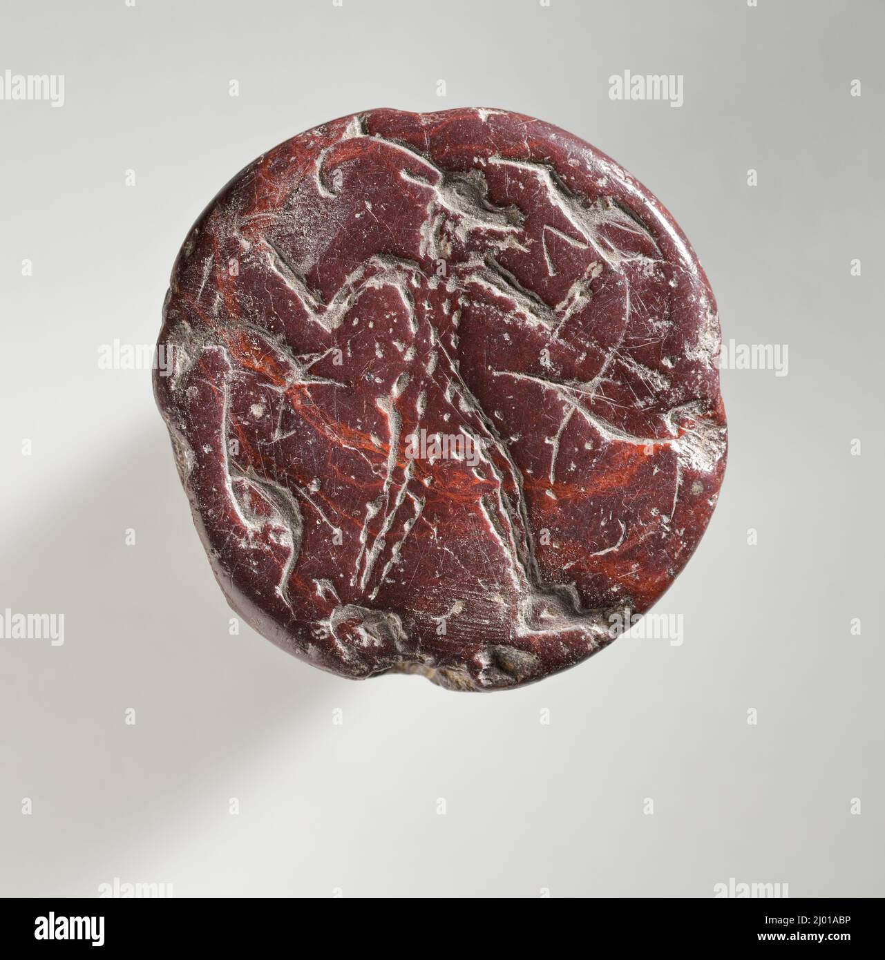 Cachet, hémisphéroïde. Ouest de l'Iran, vers 4th millénaire avant J.-C.. Outils et équipement; joints. Acier rouge Banque D'Images