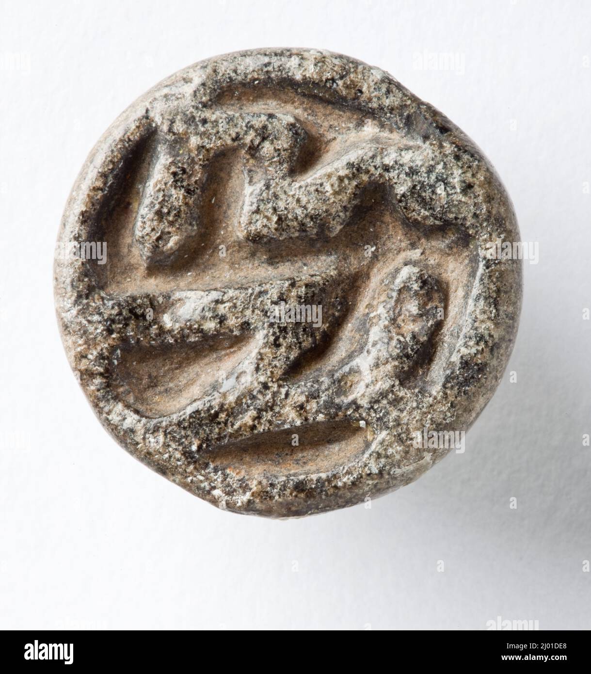 Cachet. Nord de la Syrie ou Sud-est de l'Anatolie, vers 3500 - 3000 av. J.-C. Outils et équipement; joints. Serpentin noir Banque D'Images
