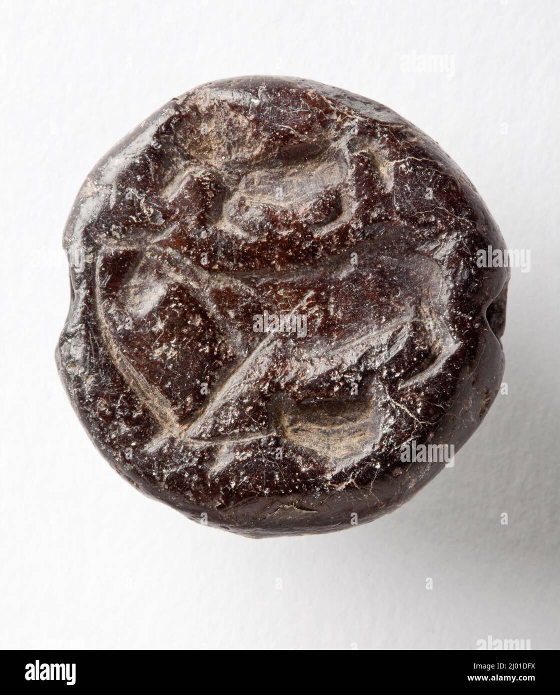 Cachet, hémisphéroïde. Nord de la Syrie ou Sud-est de l'Anatolie, environ 6th-4th millénaire avant le début de la Colombie-Britannique. Outils et équipement; joints. Serpentin brun foncé Banque D'Images