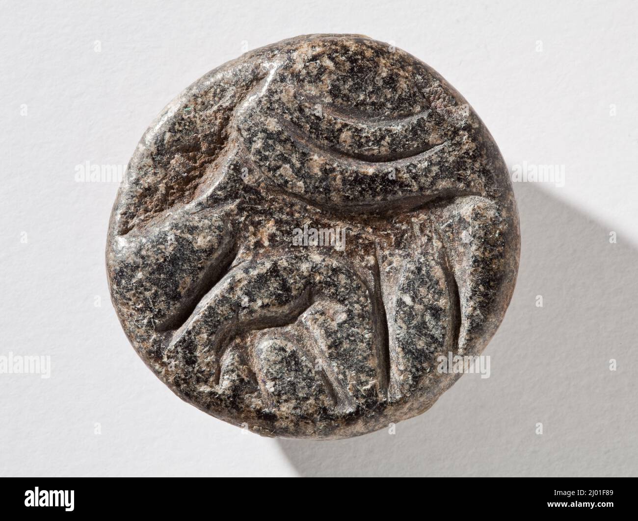 Cachet, hémisphéroïde. Ouest de l'Iran, vers 4th millénaire avant J.-C.. Outils et équipement; joints. Serpentine marbrée de gris Banque D'Images