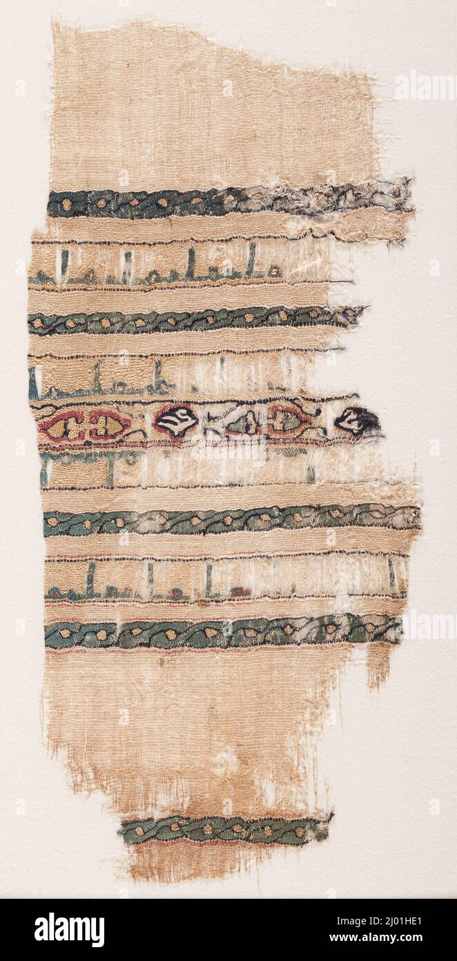 Fragment de textile inscrit (Tiraz). Égypte, islamique ; Fatimide, 11th siècle. Textiles; tiraz. Tissage de la tapisserie de soie sur du linge de lit Uni Banque D'Images