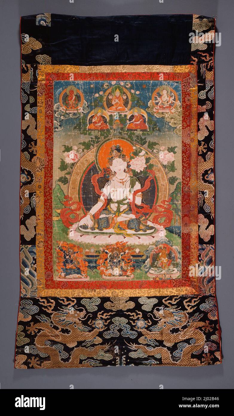 La Déesse bouddhiste Sita Tara (Tara blanc). Centre du Tibet, d'un monastère de Gelukpa, 19th siècle. Peintures. Pigments minéraux et or sur toile de coton; bordures en soie Banque D'Images