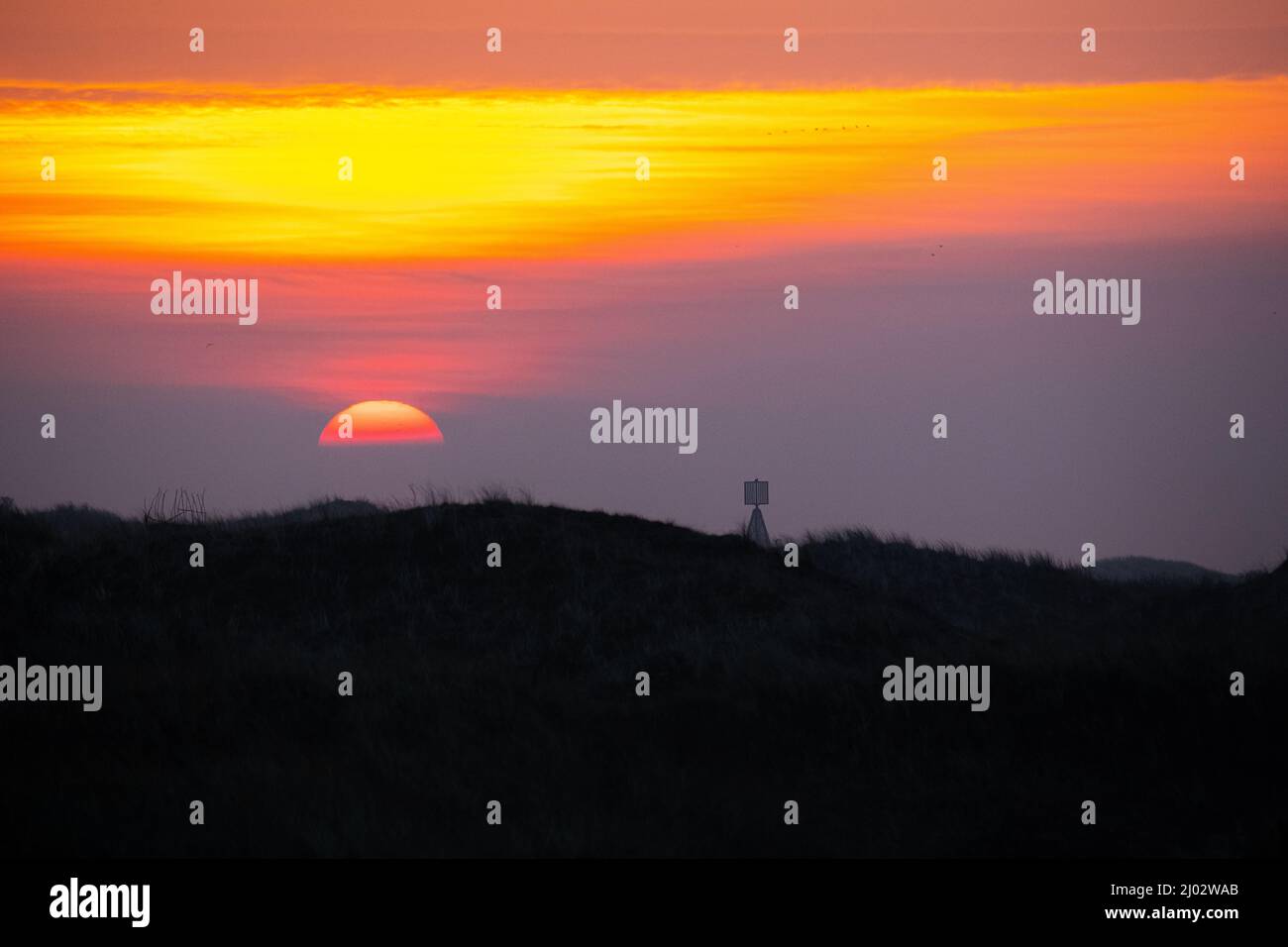 Lever du soleil sur l'île de Juist, dans la partie est de l'île Banque D'Images