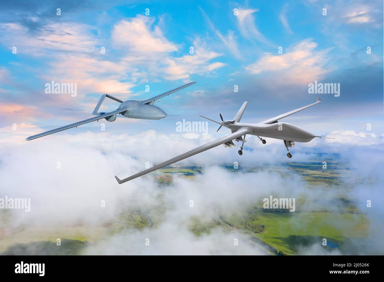 Les drones en vol les uns après les autres effectuent une surveillance sur le territoire Banque D'Images