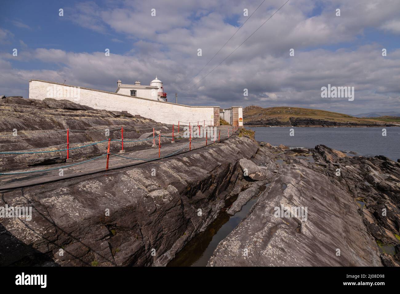 Phare de l'île de Valence sur la côte Atlantique du comté de Kerry, Irlande Banque D'Images