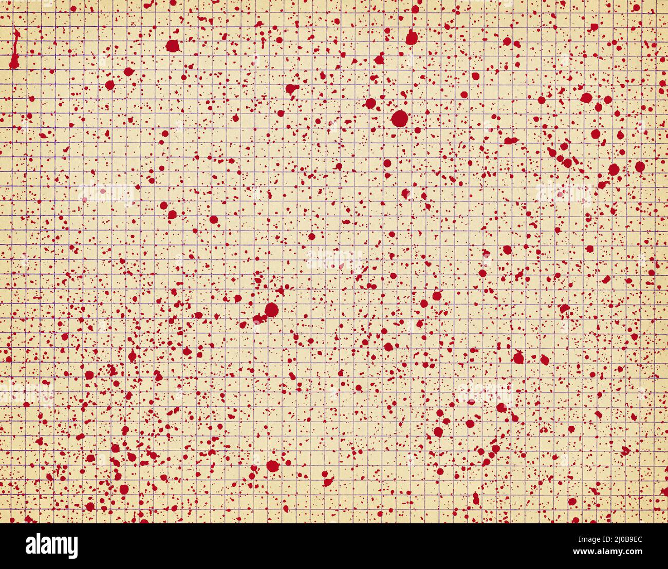 Papier quadrillé avec des taches rouges Banque D'Images