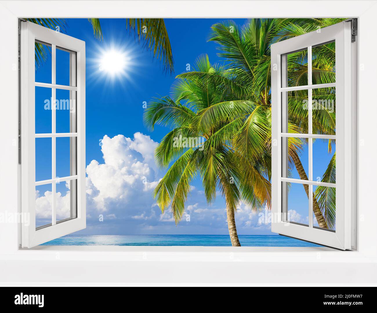 Vue d'une fenêtre ouverte sur un paysage tropical. Banque D'Images
