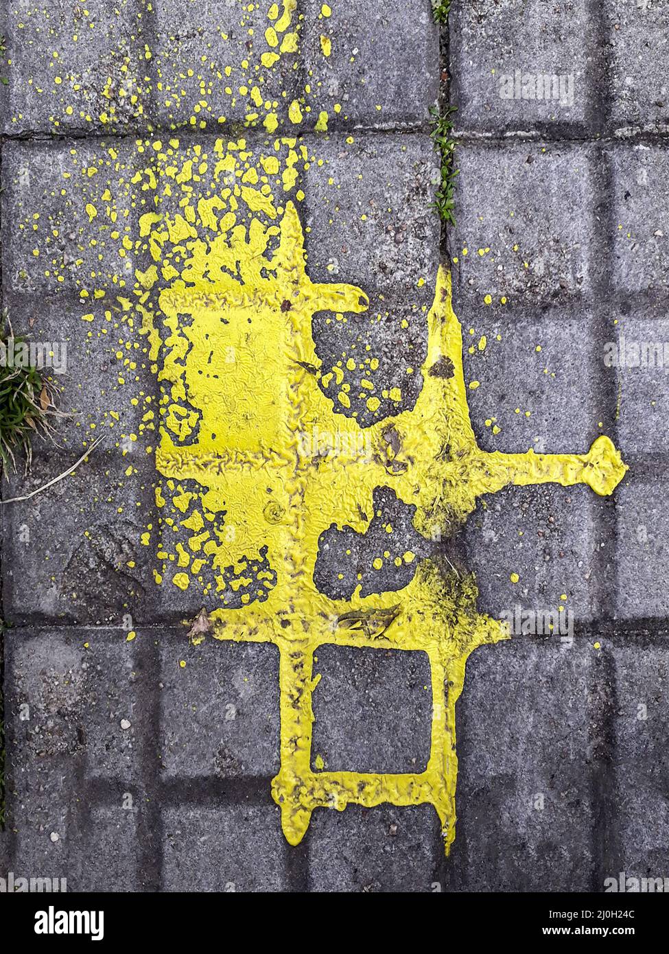 Peinture jaune sur trottoir vue du dessus Banque D'Images