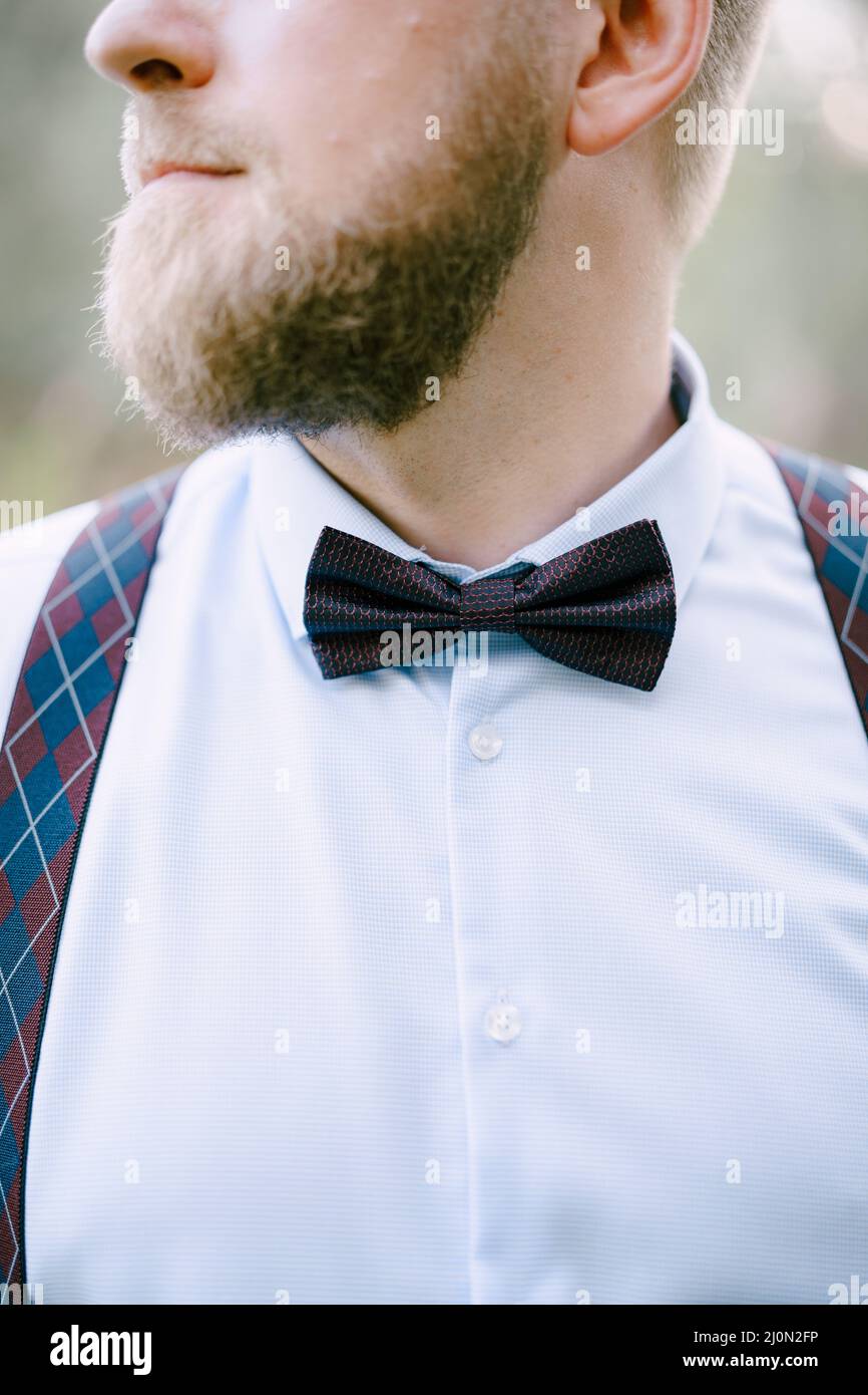 Bow tie suspenders Banque de photographies et d'images à haute résolution -  Alamy