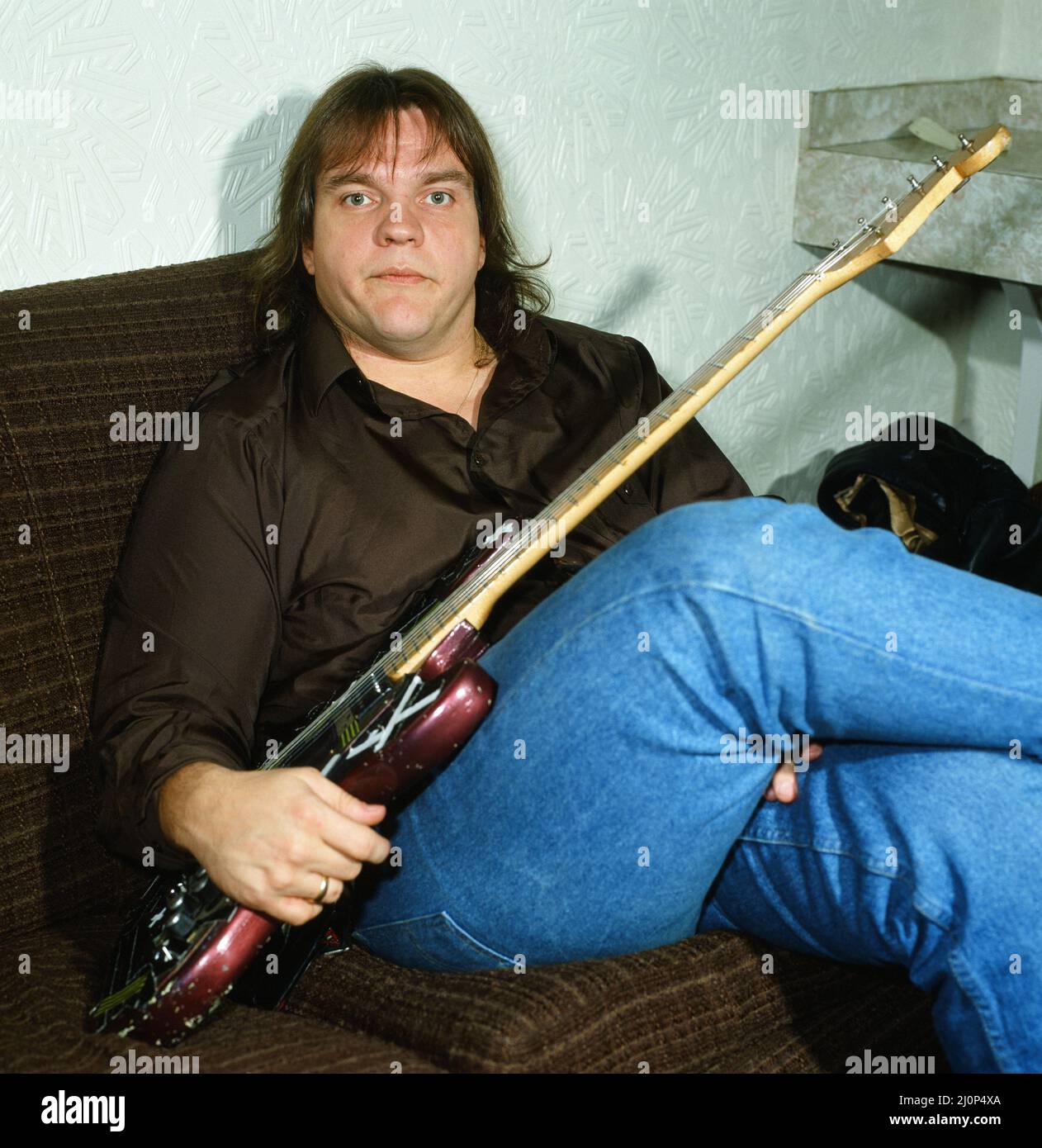 Le musicien Meat Loaf joue de la guitare. Septembre 1983. Banque D'Images