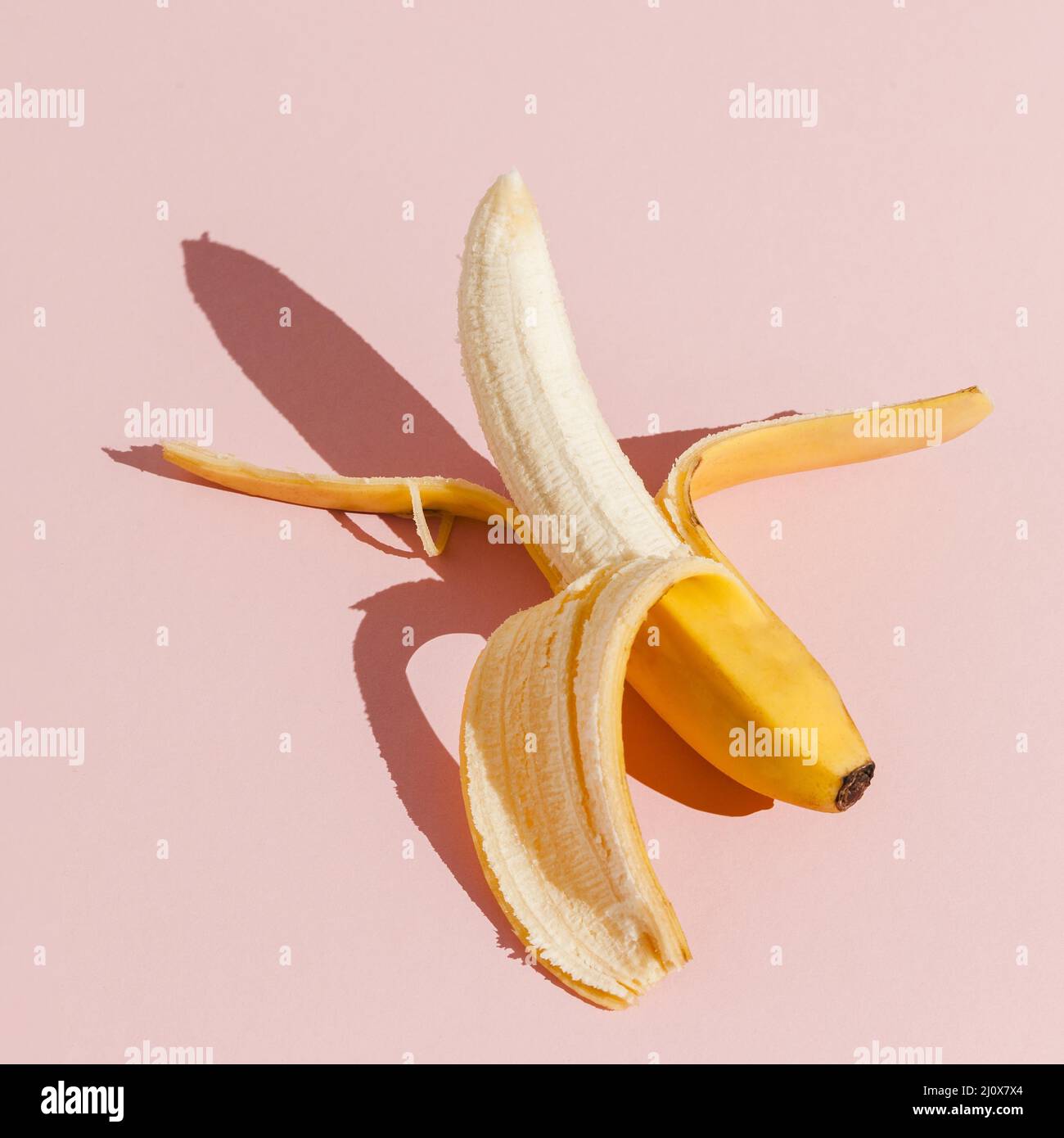 Vue de dessus fond rose banane Banque D'Images