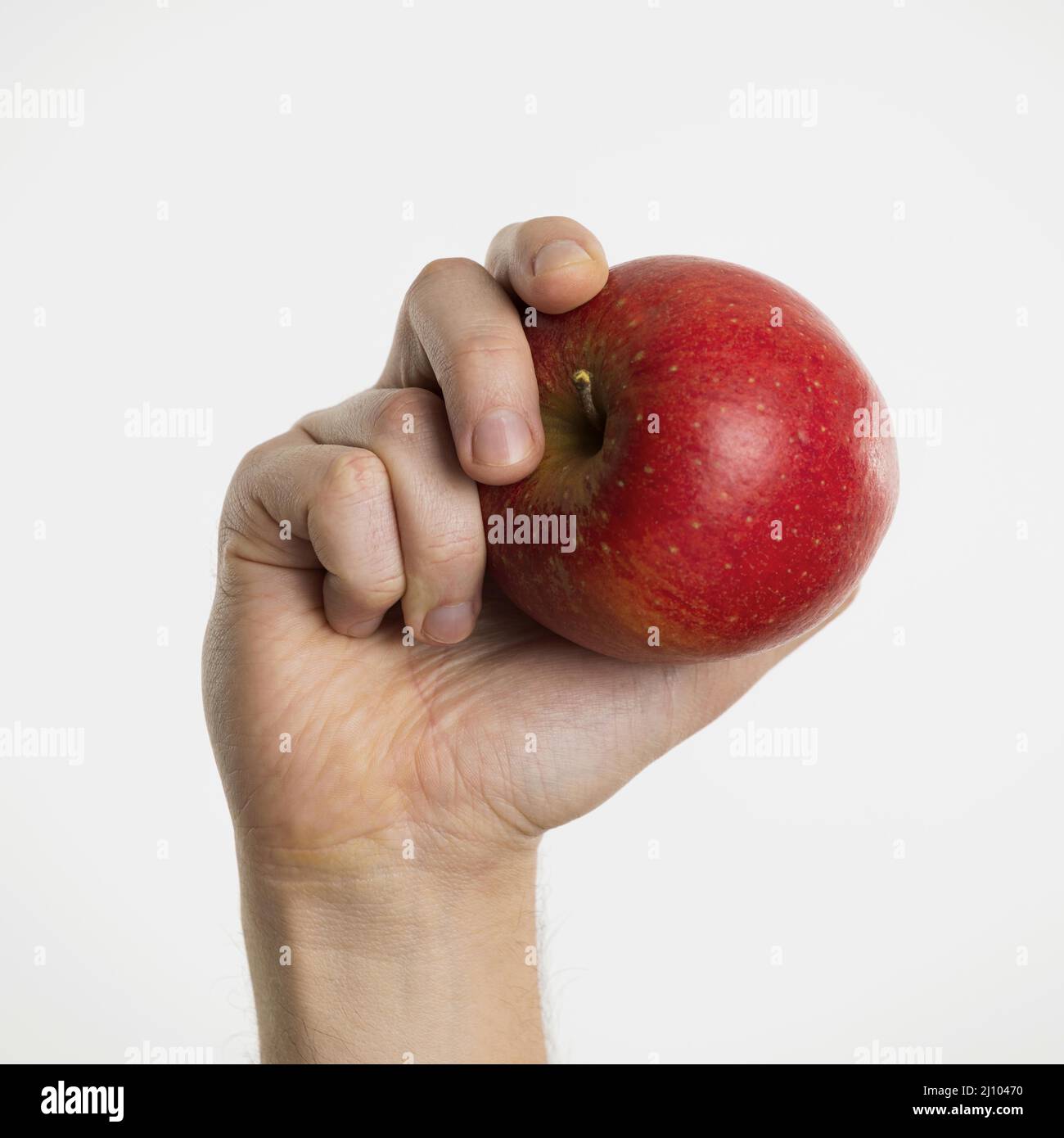 Hand holding apple Banque D'Images