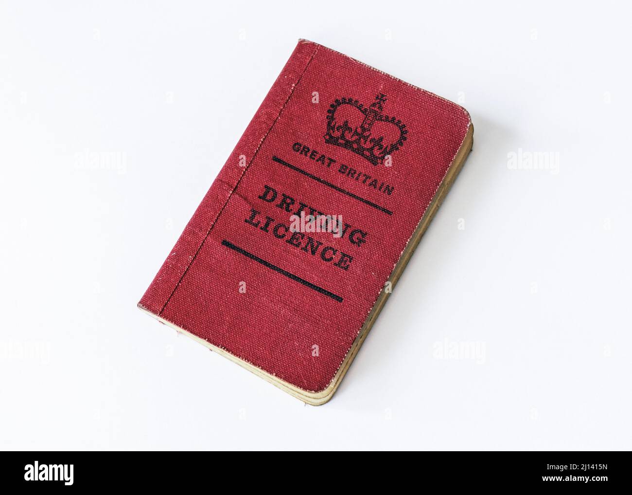Un livret de permis de conduire britannique recouvert de lin rouge de la v.1970 Banque D'Images