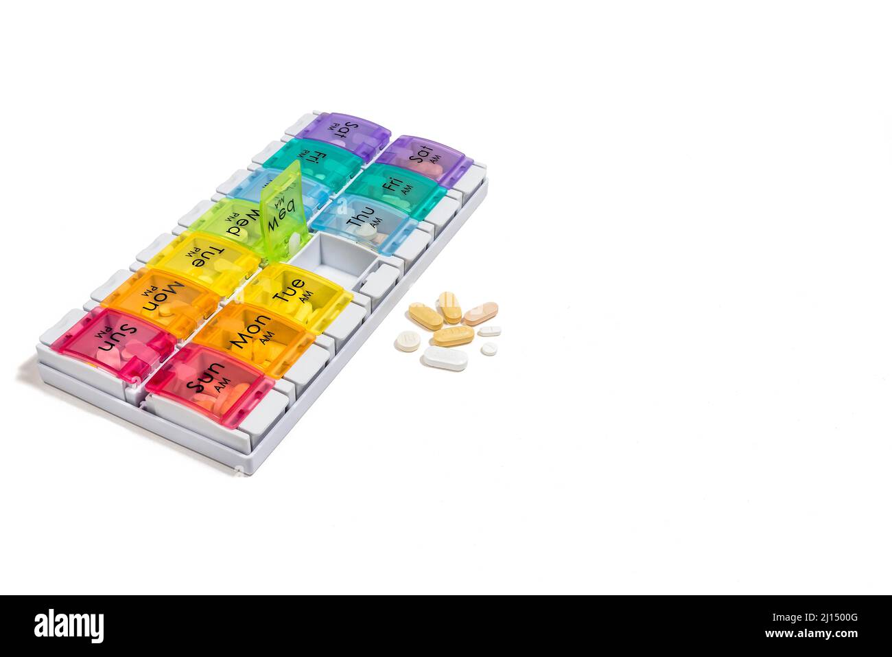 7 Day Pill Box distributeur, week and a Day Pill Box Organizer, pour les patients atteints de cancer - fond blanc pur Banque D'Images