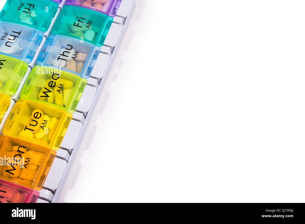 7 Day Pill Box distributeur, week and a Day Pill Box Organizer, pour les patients atteints de cancer - fond blanc pur Banque D'Images