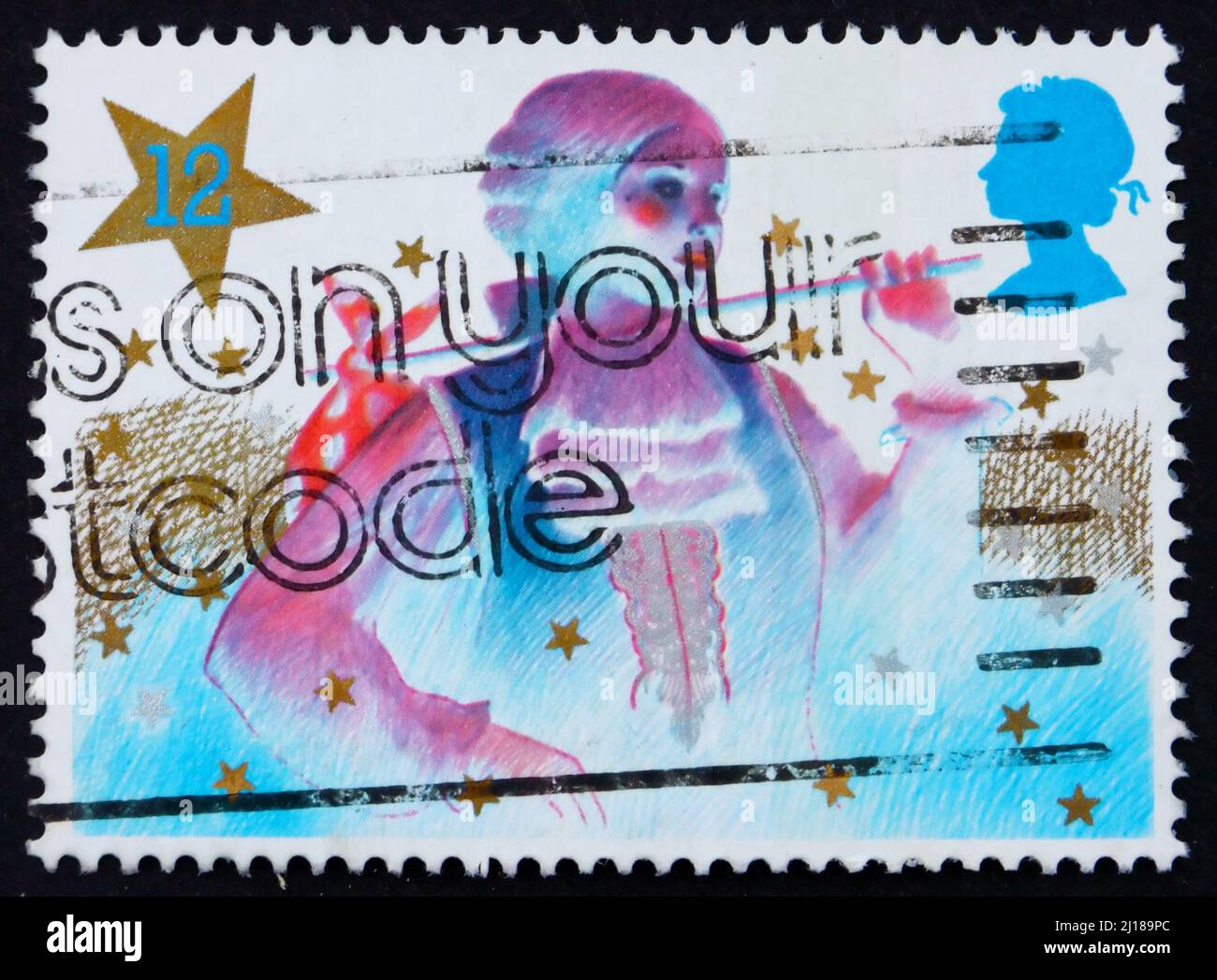 GRANDE-BRETAGNE - VERS 1985: Un timbre imprimé en Grande-Bretagne montre le garçon principal, pantomime de Noël, vers 1985 Banque D'Images