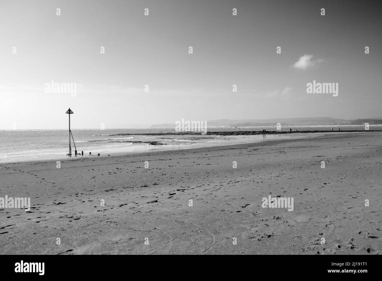 Marque de navigation sur la plage à Exmouth Banque D'Images
