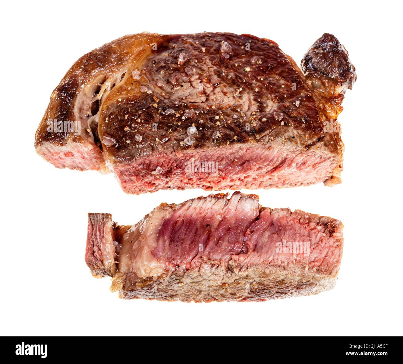 steak de bœuf de la ribeye cuit, moyen, coupé en tranches, isolé sur fond blanc Banque D'Images