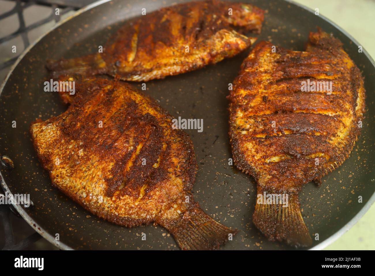 Images de la réserve de frites de Karimeen Banque D'Images