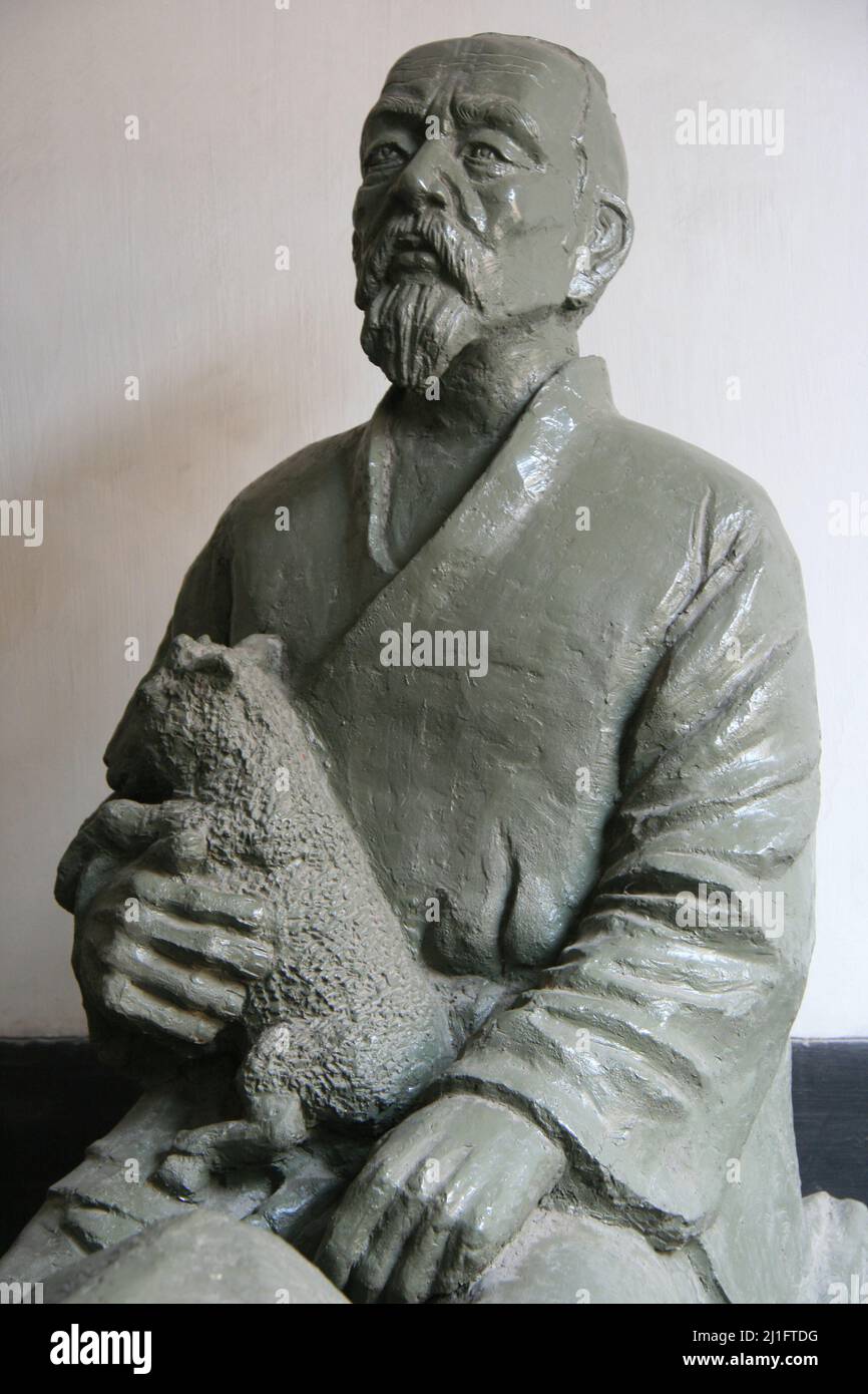 statue d'un éleveur de moutons dans le manoir de la famille des changs fermé à pingyao (chine) Banque D'Images